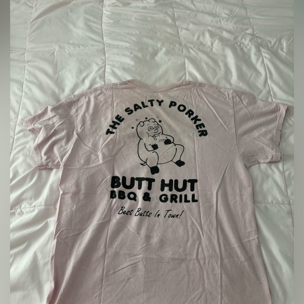 graphic tee shirt with pig on it.